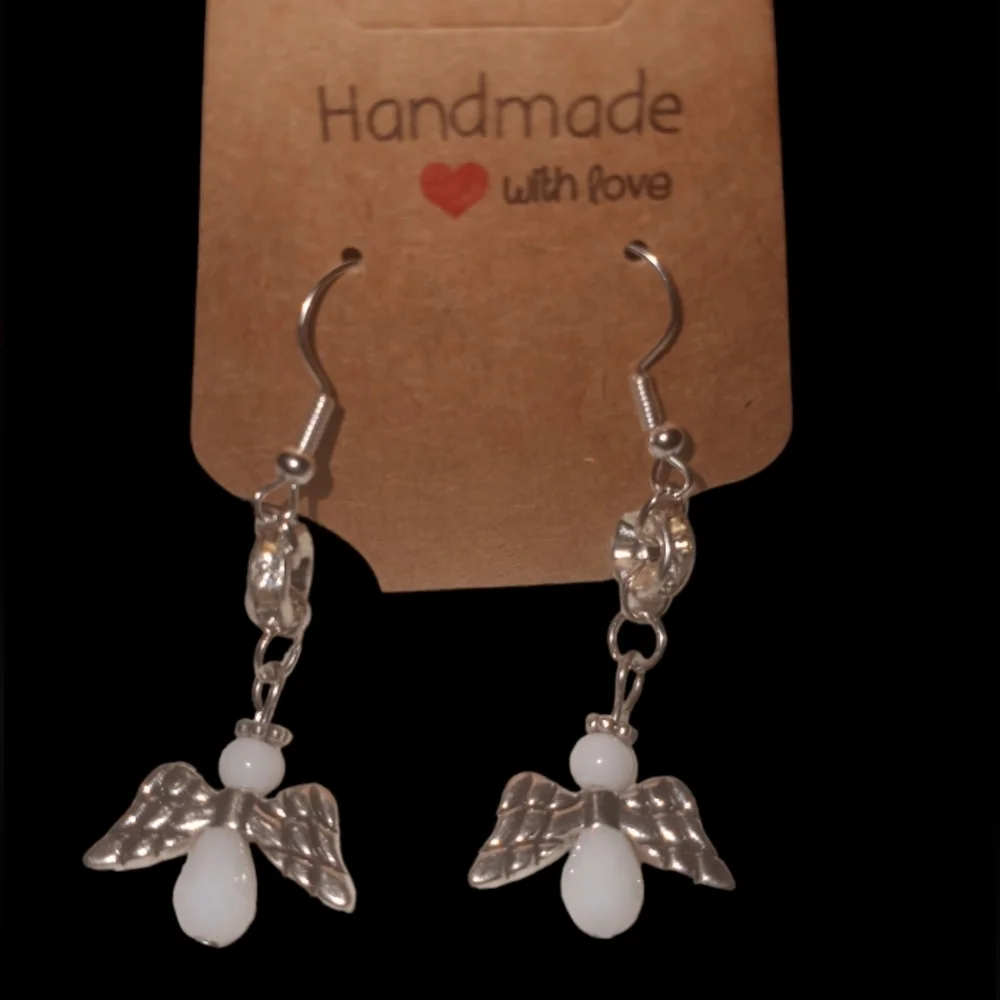 White angel dangle earrings